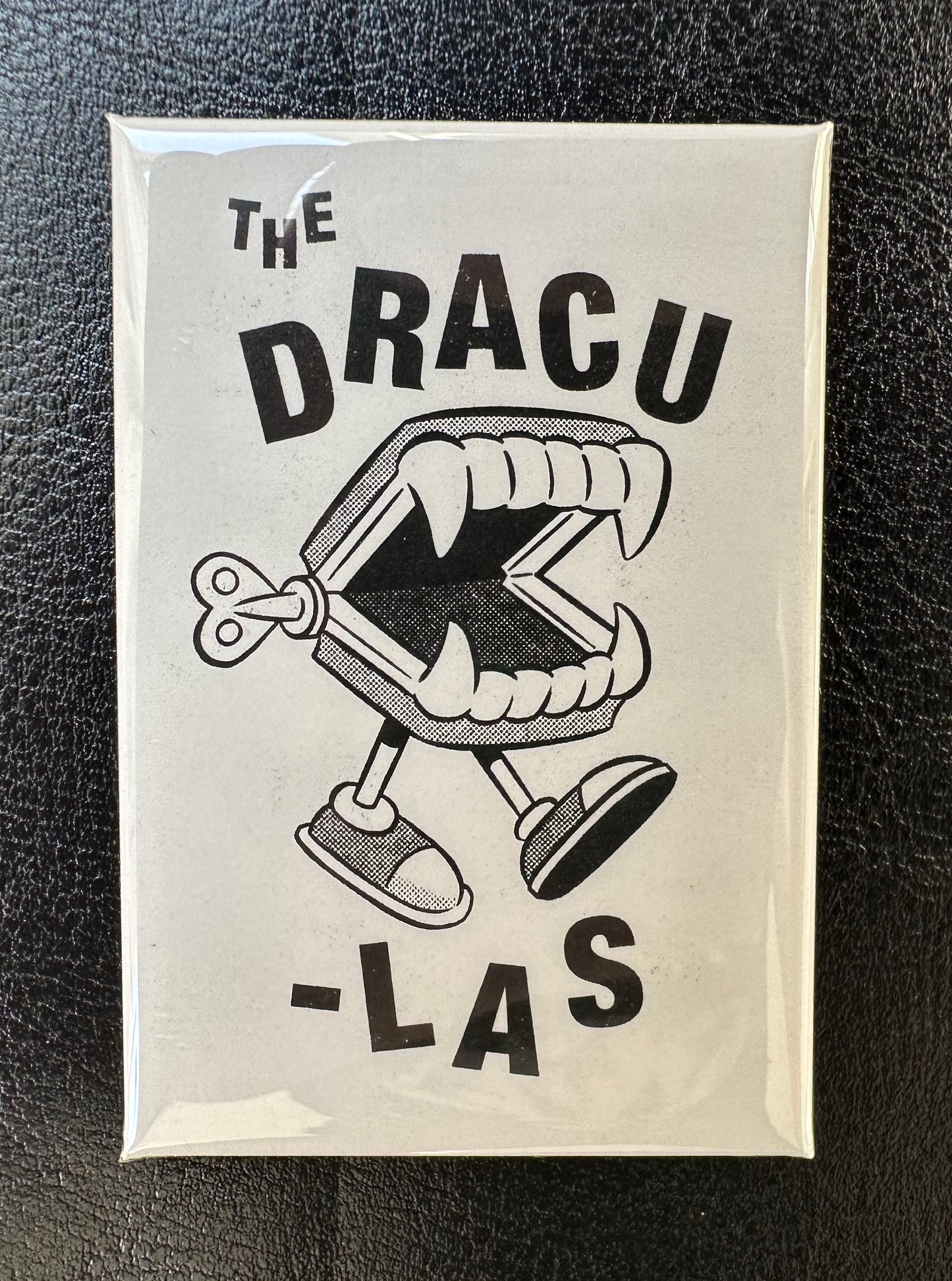 Wind-Up Fangs Fridge Magnet